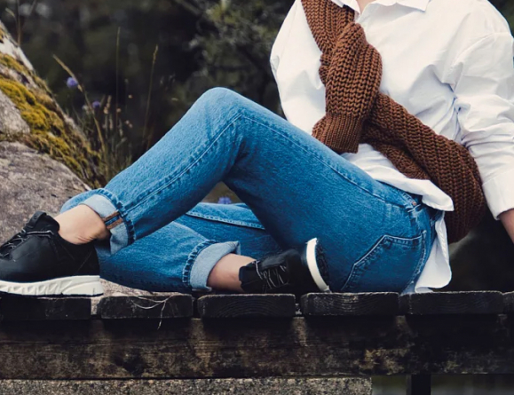 Girl sitting with comfortable shoes